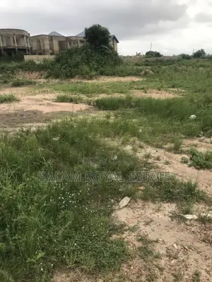 Half Plot With Wall at Amasaman Kasoa Road