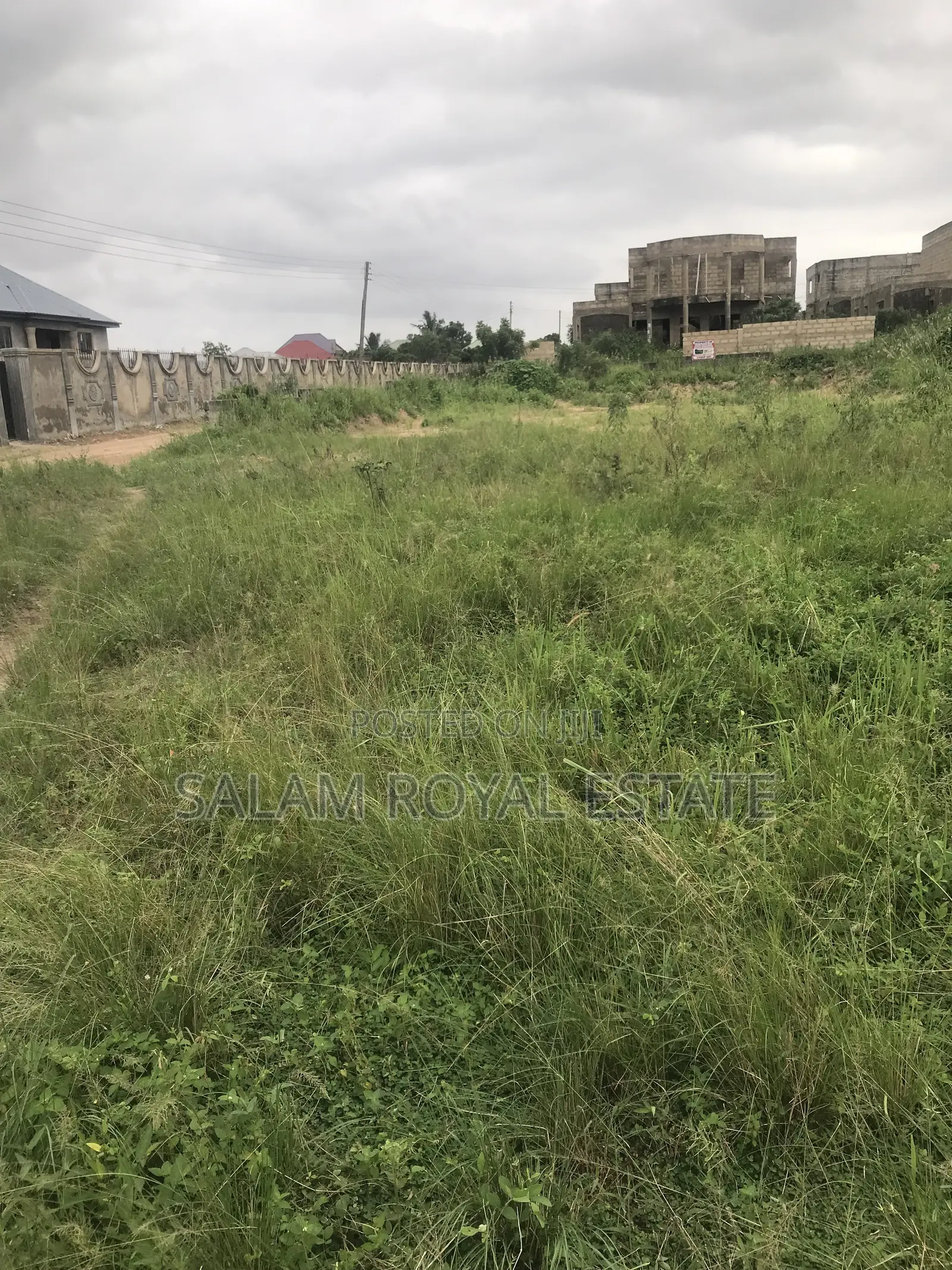Half Plot With Wall at Amasaman Kasoa Road
