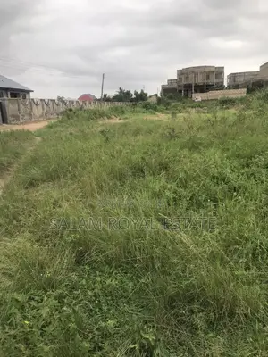 Half Plot With Wall at Amasaman Kasoa Road