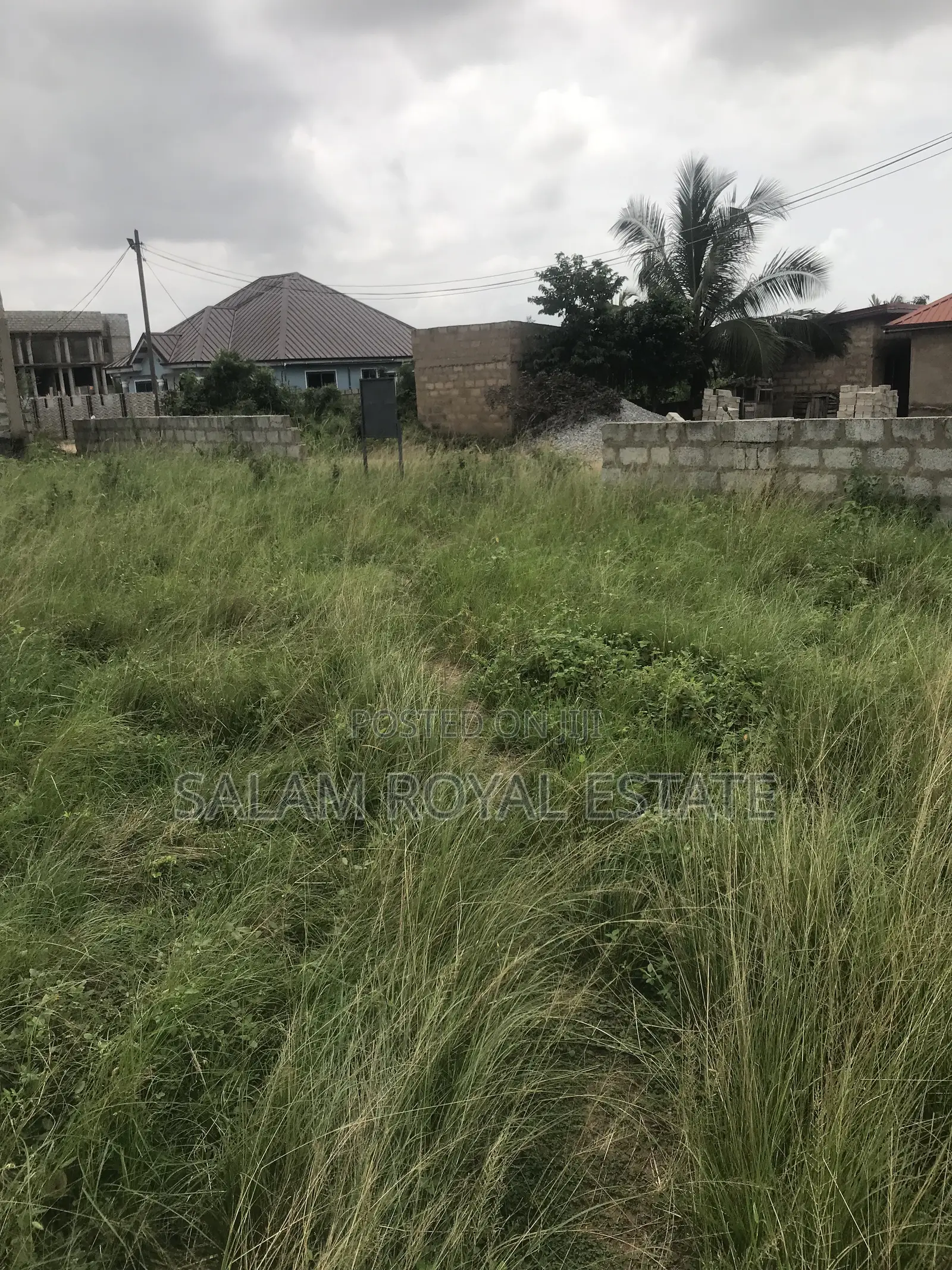 Half Plot With Wall at Amasaman Kasoa Road