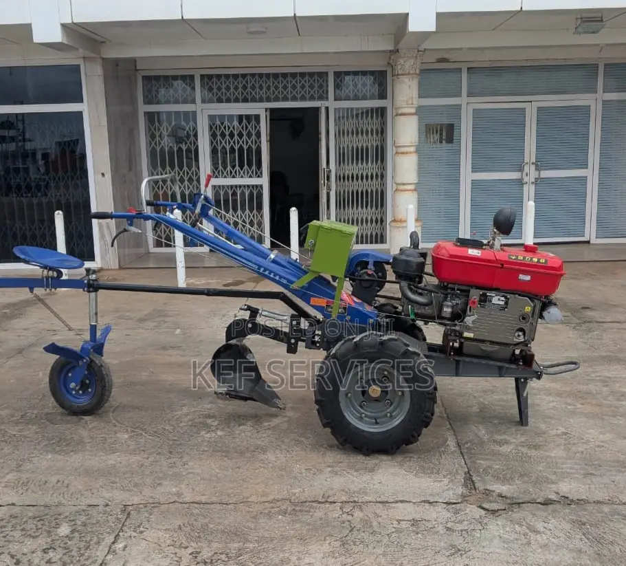 18hp Power Tiller With Attachments