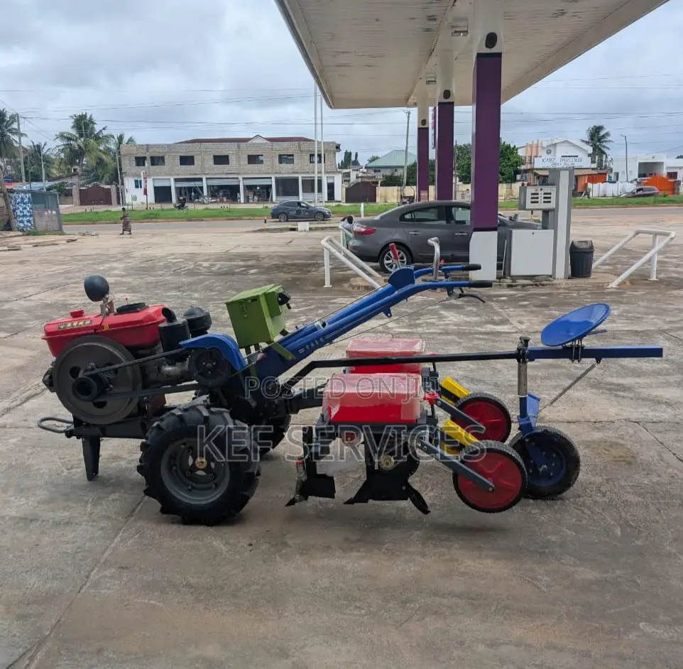 18hp Power Tiller With Attachments
