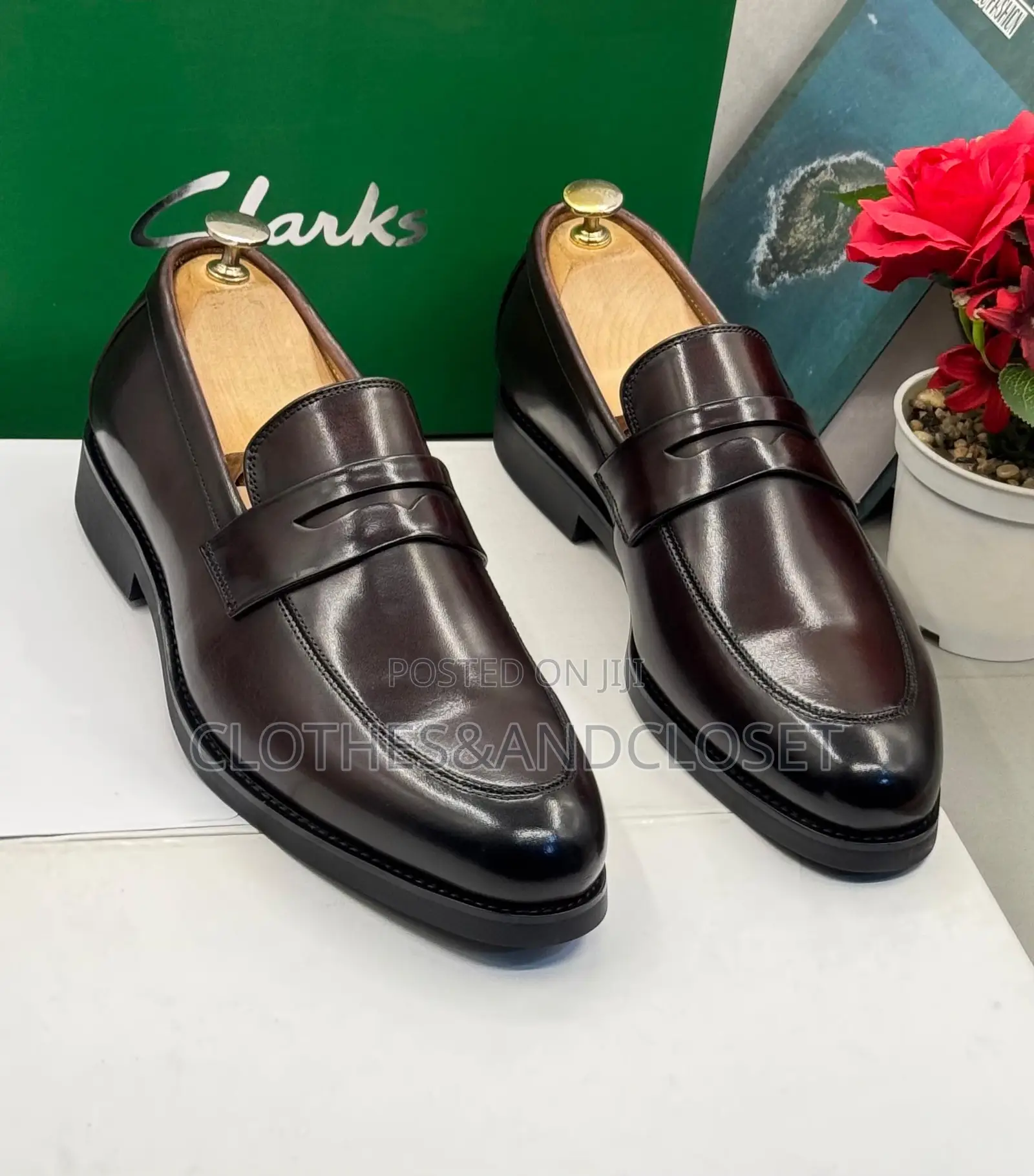 Clarks Black Leather Penny Loafers Featuring a Classic Slip-on Design