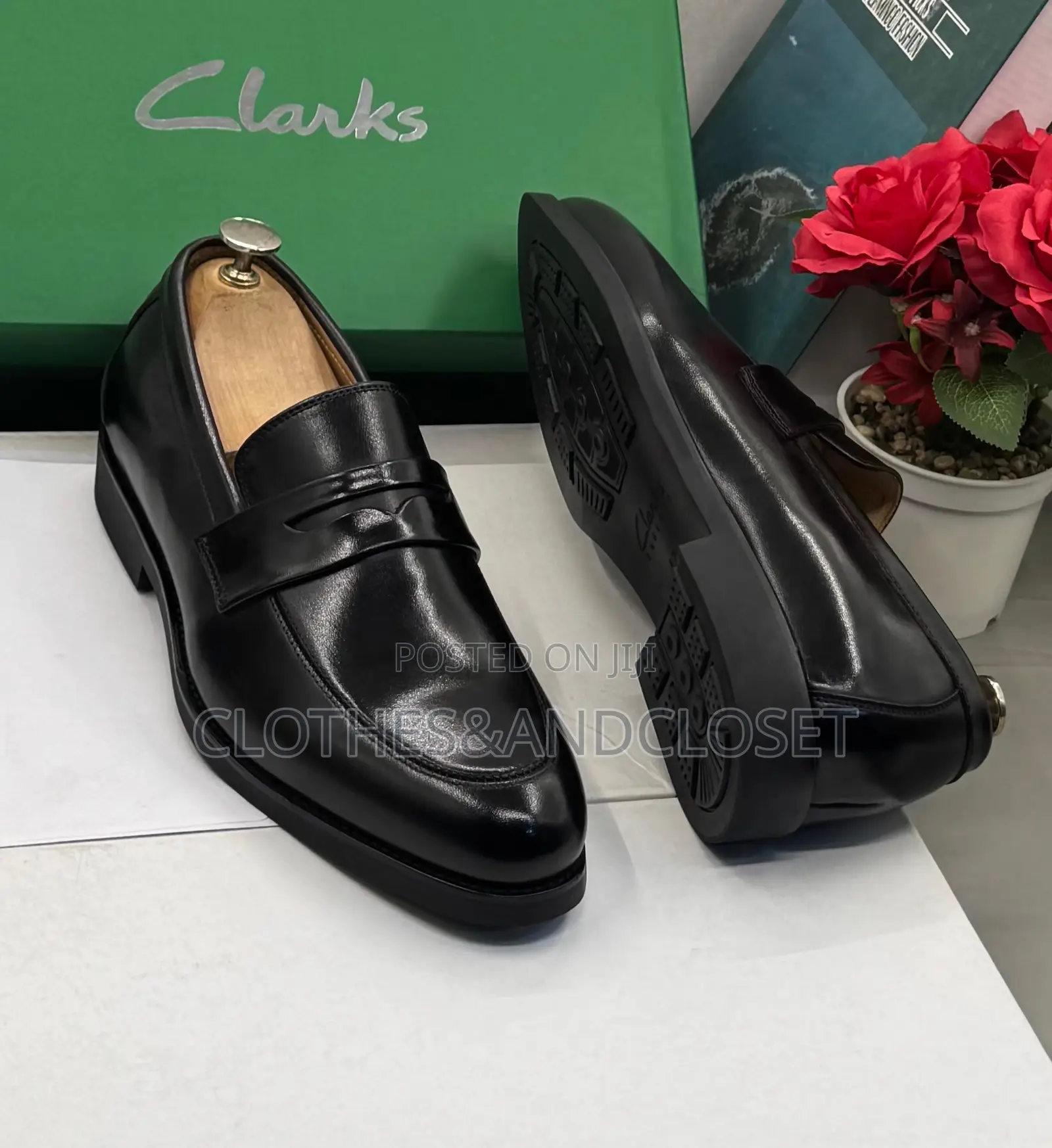Clarks Black Leather Penny Loafers Featuring a Classic Slip-on Design