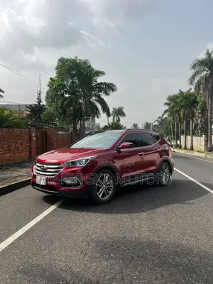 Hyundai Santa Fe Limited 4dr SUV AWD (3.3L 6cyl 6A) 2015 Red