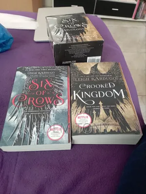 Six of Crows Duology by Leigh Bardugo; Six of Crows Crooked Kingdom.