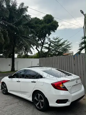 Honda Civic Touring 2dr Coupe (1.5L 4cyl) 2016 White