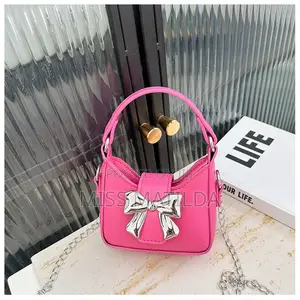 Metallic Bow Mini Handbag and Crossbody Strap