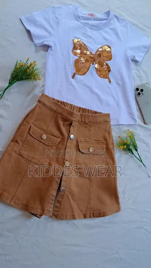 This Is a Three-Piece Children's Outfit Laid Out Flat,