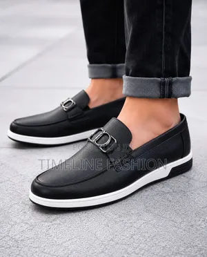 Black and White Tod's Casual Wear Loafers