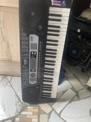 RJ654 54-Key Portable Electronic Keyboard.