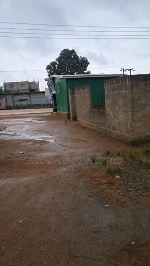 Half Plot of Land at Amasaman Obeyeyie Roadside for Sale