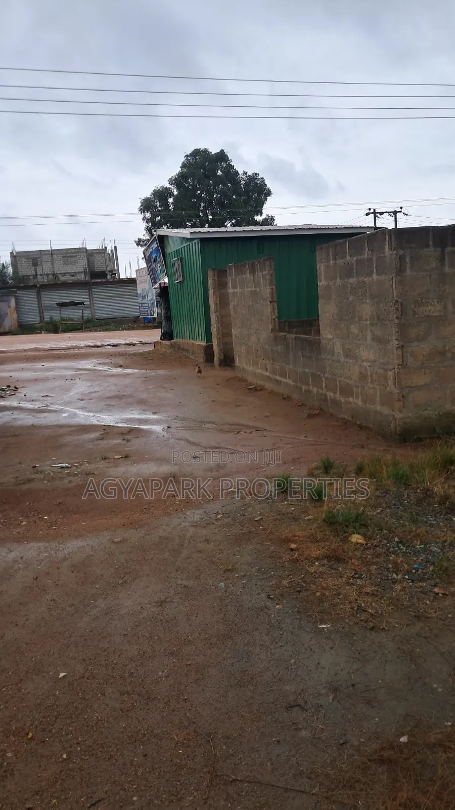 Half Plot of Land at Amasaman Obeyeyie Roadside for Sale