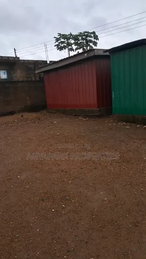 Half Plot of Land at Amasaman Obeyeyie Roadside for Sale