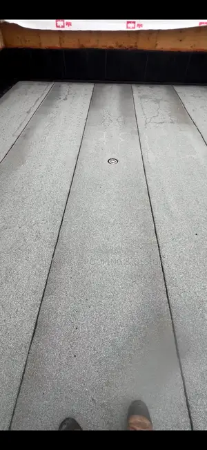 Bitumen Membrane Seals Hidden Gutters to Stop Ceiling Leaks.