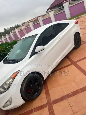 Hyundai Elantra SE Coupe FWD (1.8L 4cyl 6A) 2013 White