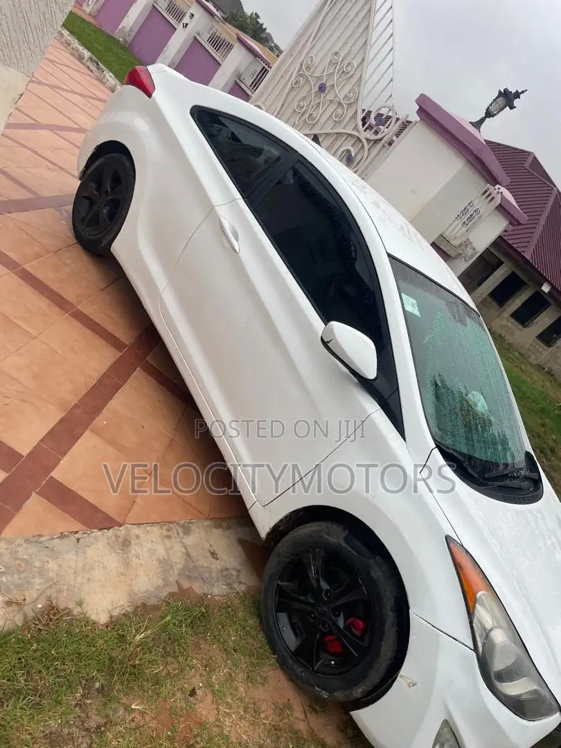 Hyundai Elantra SE Coupe FWD (1.8L 4cyl 6A) 2013 White