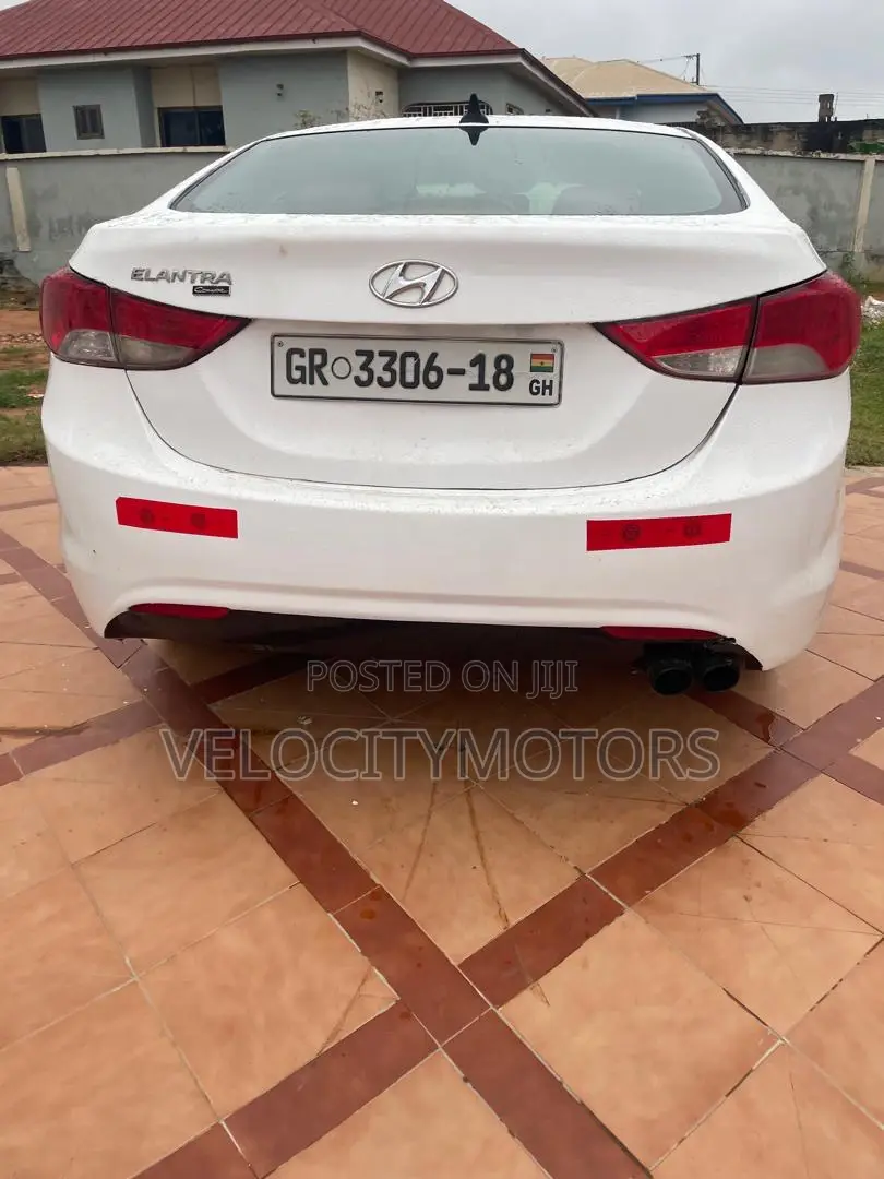 Hyundai Elantra SE Coupe FWD (1.8L 4cyl 6A) 2013 White
