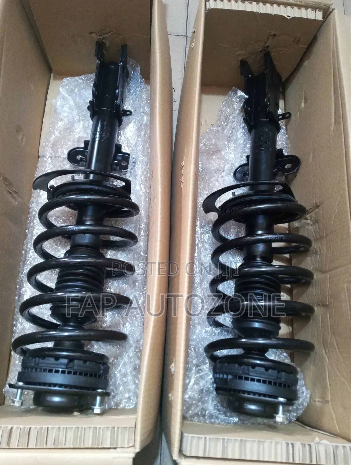 0973. Genuine Mega Chrysler T C, Grand Caravan Complete Strut From USA