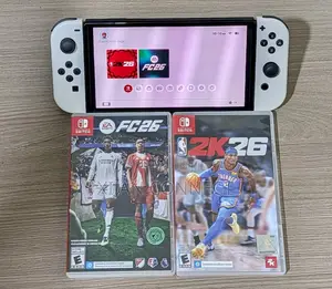 Nintendo Switch OLED With Protective Glass + FC 26 NBA 2K26 Catridge
