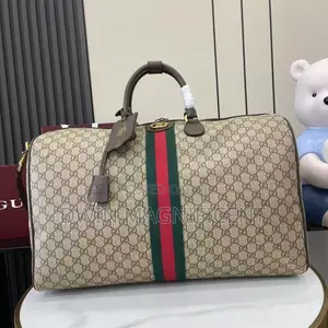 Gucci Savoy and Louis Vuitton Duffle Bag