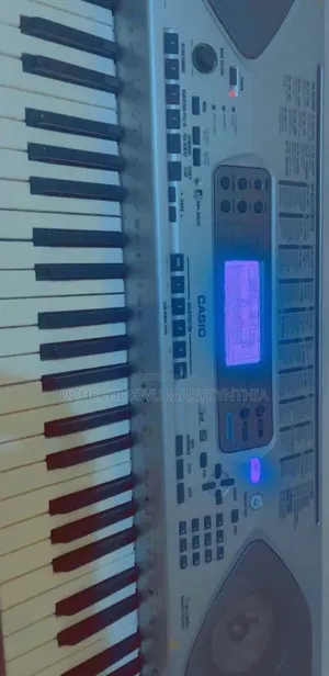 Clean Casio CTK-900 Music Keyboard (Comes With Free Stand)