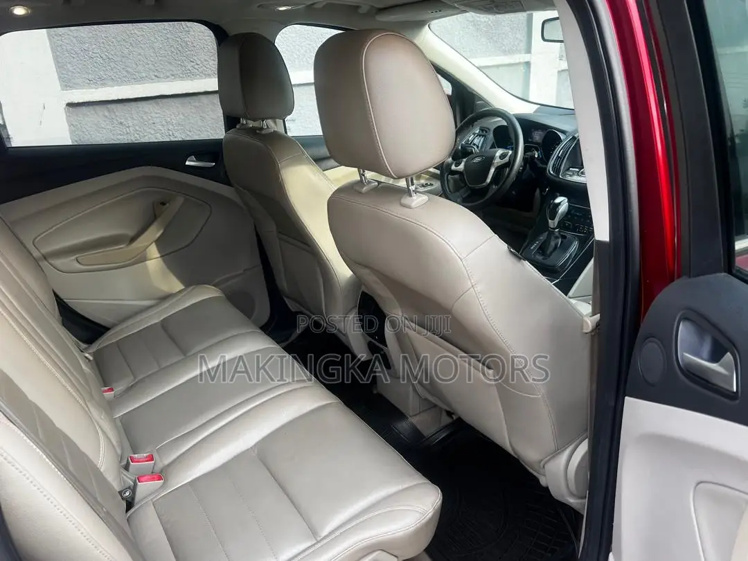 Ford Escape Titanium 4dr SUV AWD (1.6L 4cyl Turbo 6A) 2014 Red