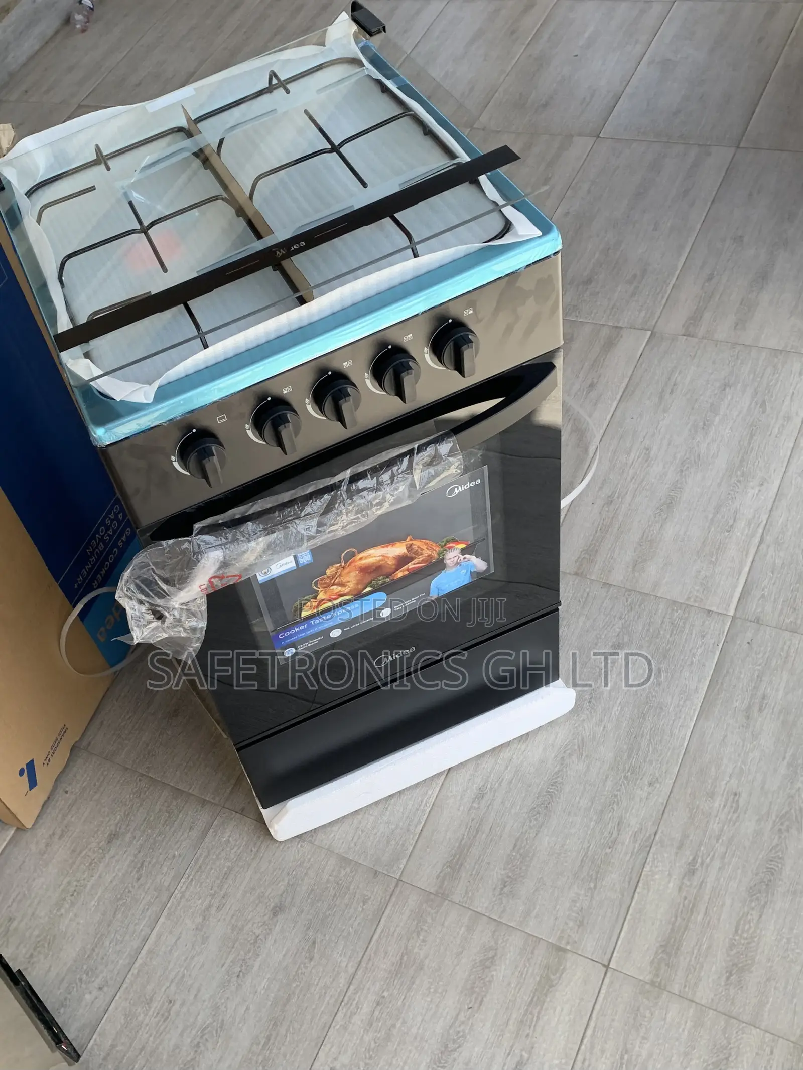 Purchase Black Midea 4-Burner Gas Cooker Oven Grill