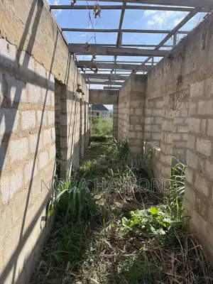 4 Bedrooms and 5 Washrooms Uncompleted Building on a Half Plot