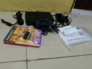 New PS2 Slim in Box With 18 Games
