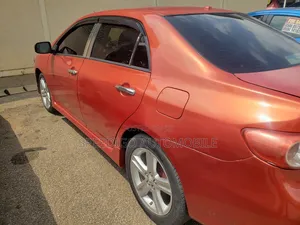 Toyota Corolla S 4dr Sedan (1.8L 4cyl 4A) 2013 Orange
