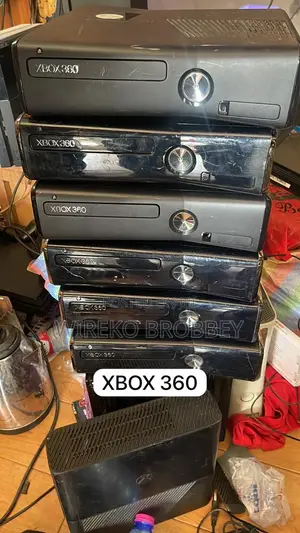 Xbox 360 Consoles With Games Loaded and 2 Controllers