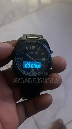 Kenneth Cole Unlisted Watch Features a Display Analog Digital Screen.