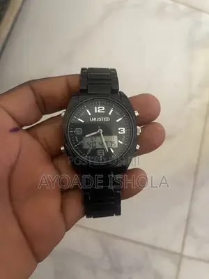 Kenneth Cole Unlisted Watch Features a Display Analog Digital Screen.
