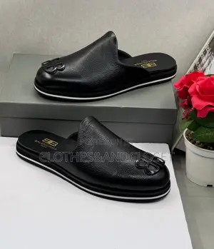 Balenciaga Cosy BB Mules Featuring a Black Textured Leather Upper