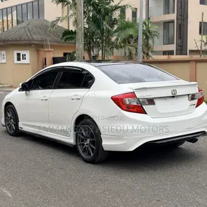 Honda Civic EX-L 4dr Sedan w/Nav (1.8L 4cyl CVT) 2014 Pearl