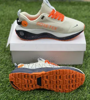 Nike Off White and Orange Trainers