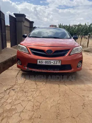 Toyota Corolla LE 4dr Sedan (1.8L 4cyl 4A) 2012 Orange
