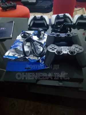 PS3 Slim Console + 10 Games Installed+ 2 Controllers
