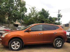 Nissan Rogue 2010 Orange
