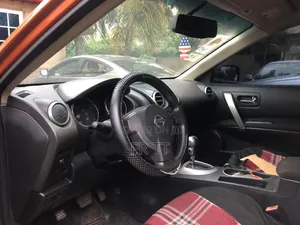 Nissan Rogue 2010 Orange