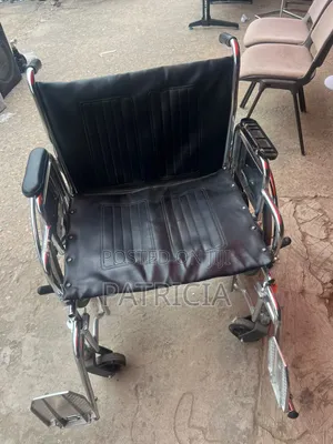 Manual Wheelchair – Black Leather Seat Chrome Frame