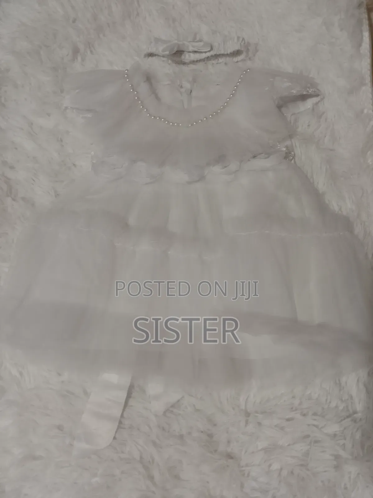 A White Dress for Your Baby Naming Ceremony