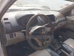 Vehicle Mitsubishi Picked Up
