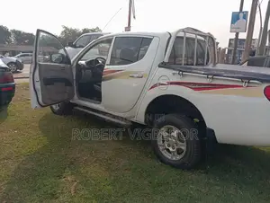 Vehicle Mitsubishi Picked Up